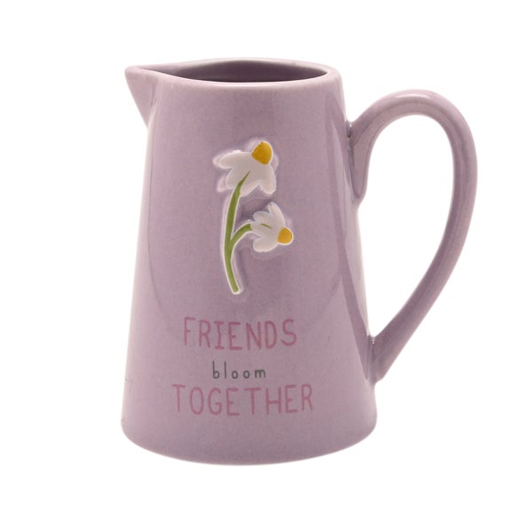 Click to view product details and reviews for Love Life Friends Embossed Ceramic Jug.