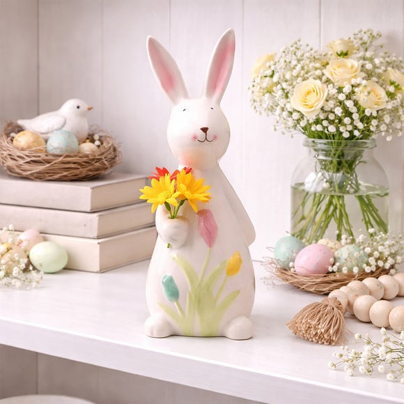 Eggstraordinary Gift Co. Ceramic Bunny Holding Flowers Ornament
