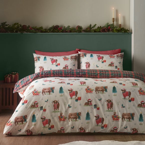 Photo of catherine lansfield christmas highland cow polycotton duvet cover & pillowcase set