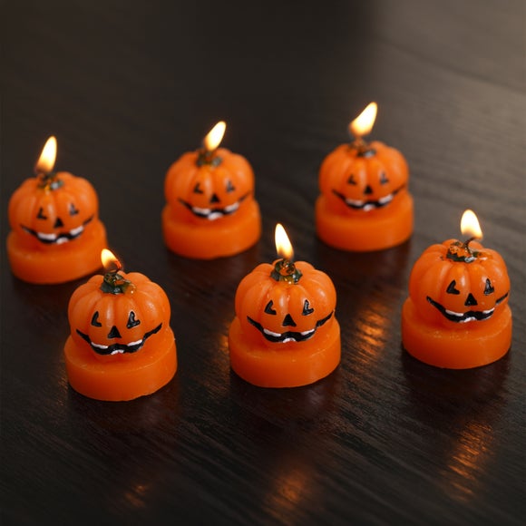Hocus Pocus Set of 6 Pumpkin Debossed Smiley Face Tealight Candles