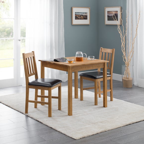 white table with red chairs