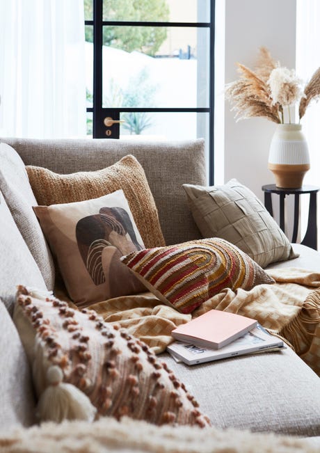 Artisan / Cosy cushions and throws lifestyle imagery