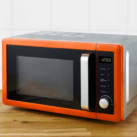 Цвета свч. ДНС микроволновая печь оранжевая. Оранжевая микроволновая печь. Микроволновка оранжевая. Микроволновки оранжевого цвета.